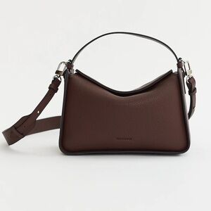 The Horse - Clementine in the color Coffee